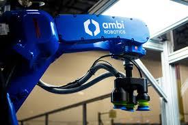 Robotic arm acting as a materials handling system for manufacturing