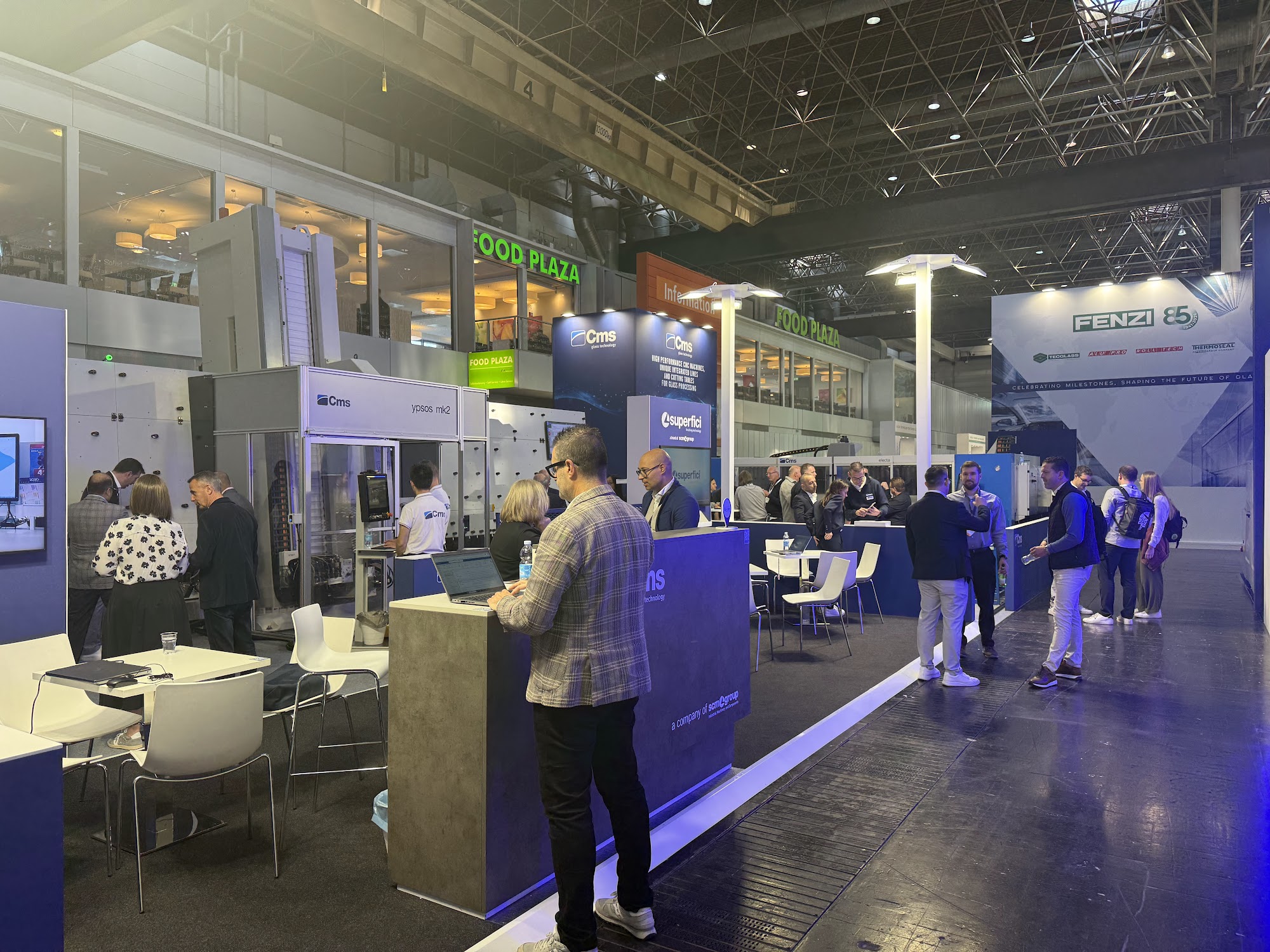 Visitors on the CMS stand at Glasstec 2026 in Düsseldorf
